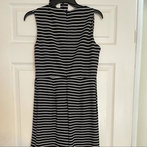 Calvin Klein Striped Jumpsuit. NWT with Defects
